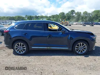 2019 Mazda CX-9 Grand Touring with VIN JM3TCBDY6K0335886, listed as a IAAI auction lot 42704250 with 37,171 mi miles and . Bid and sale history available at DreamBid. Image 12.