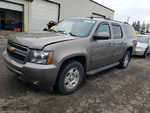 2013 Chevrolet Suburban LT with VIN 1GNSKJE7XDR101702, listed as a Copart auction lot 45577695 with 182,576 mi miles and Salvage Title. Bid and sale history available at carsss.com. Image 1.
