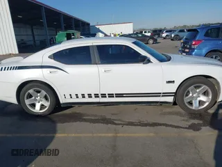 2010 Dodge Charger Police with VIN 2B3AA4CT5AH161604, listed as a IAAI auction lot 41814567 with 195,507 mi miles and . Bid and sale history available at DreamBid. Image 13.