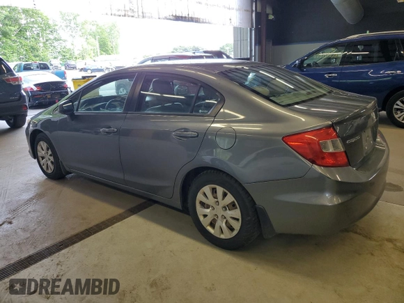 2012 Honda Civic LX z VIN 2HGFB2F59CH313357, wystawiony jako Copart lot #59526905 z przebiegiem 253 322 mil mil oraz Czysty tytuł • Clean title. Historia ofert i sprzedaży dostępna na DreamBid. Obrazek 2.