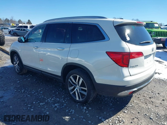2017 Honda Pilot Touring with VIN 5FNYF6H95HB094641, listed as a IAAI auction lot 41531652 with 97,615 mi miles. Bid and sale history available at carsss.com. Image 3.