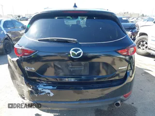 2019 Mazda CX-5 Sport with VIN JM3KFABM7K1579747, listed as a IAAI auction lot 41965097 with 151,042 mi miles and . Bid and sale history available at DreamBid. Image 17.