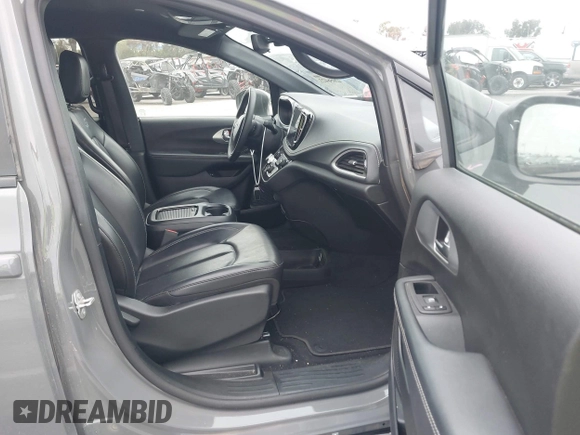 2023 Chrysler Pacifica Hybrid Touring L with VIN 2C4RC1L71PR584485, listed as a IAAI auction lot 42056423 with 58,955 mi miles and . Bid and sale history available at DreamBid. Image 5.