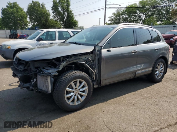 2015 Volkswagen Touareg Lux с VIN WVGEP9BP2FD004595, выставлен на аукционе Copart как лот 59020375 с пробегом 135 319 миль миль и Списание • Salvage title. История ставок и продаж доступна на DreamBid. Изображение 1.