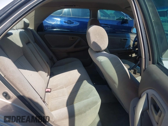 2001 Toyota Camry CE z VIN 4T1BG22K01U053432, wystawiony jako IAAI lot #42257822 z przebiegiem 128 610 mil mil oraz . Historia ofert i sprzedaży dostępna na DreamBid. Obrazek 8.
