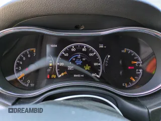 2018 Jeep Grand Cherokee Altitude with VIN 1C4RJFAG2JC148282, listed as a Copart auction lot 57315295 with 98,453 mi miles and Salvage title. Bid and sale history available at DreamBid. Image 9.