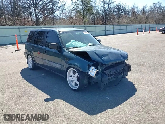 1997 Honda CR-V z VIN JHLRD1853VC063765, wystawiony jako Copart lot #53443435 z przebiegiem 226 898 mil mil oraz Szkoda całkowita • Salvage title. Historia ofert i sprzedaży dostępna na DreamBid. Obrazek 12.