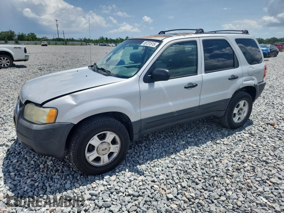 2003 Ford Escape XLT Popular with VIN 1FMYU03103KA06199, listed as a Copart auction lot 58731515 with 181,429 mi miles and Salvage title. Bid and sale history available at DreamBid. Image 1.