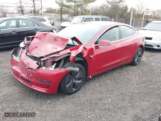 2018 Tesla Model 3 Long Range Battery with VIN 5YJ3E1EA4JF159743, listed as a IAAI auction lot 40839991 with 117,039 mi miles. Bid and sale history available at carsss.com. Image 16.