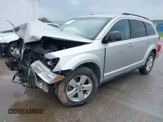 2013 Dodge Journey Canada Value z VIN 3C4PDCABXDT563439, wystawiony jako IAAI lot #42227899 z przebiegiem 213 199 mil mil oraz . Historia ofert i sprzedaży dostępna na DreamBid. Obrazek 16.
