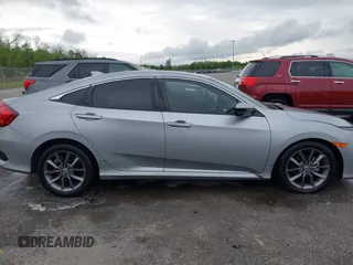 2020 Honda Civic EX-L with VIN 19XFC1F78LE001386, listed as a IAAI auction lot 41961560 with 115,745 mi miles and . Bid and sale history available at DreamBid. Image 13.