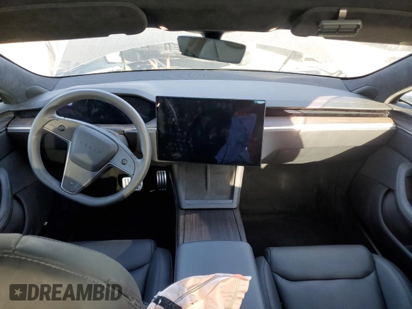 2023 Tesla Model S с VIN 5YJSA1E55PF522232, выставлен на аукционе Copart как лот 47735815 с пробегом Не указан миль и Списание • Salvage title. История ставок и продаж доступна на DreamBid. Изображение 8.