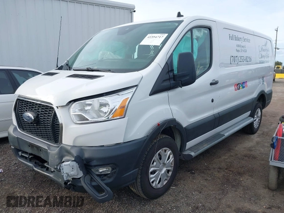 2021 Ford Transit Cargo with VIN 1FTBR1Y81MKA25014, listed as a IAAI auction lot 41594717 with 49,983 mi miles and . Bid and sale history available at DreamBid. Image 2.
