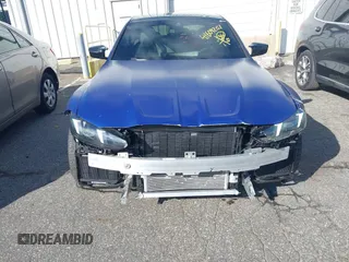 2025 BMW M3 Competition xDrive with VIN WBS33HJ05SFT74162, listed as a IAAI auction lot 41609207 with 2,912 mi miles and . Bid and sale history available at DreamBid. Image 6.