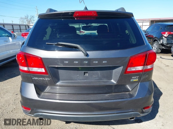 2014 Dodge Journey SXT with VIN 3C4PDCBG6ET192288, listed as a IAAI auction lot 41787594 with 132,973 mi miles. Bid and sale history available at carsss.com. Image 16.