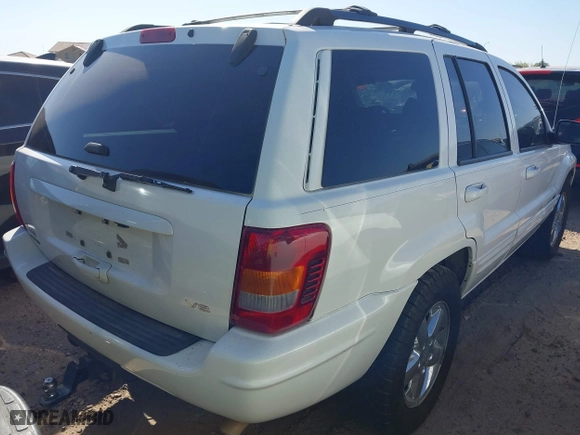 2004 Jeep Grand Cherokee Limited with VIN 1J8GW58N74C380204, listed as a IAAI auction lot 41756657 with 239,697 mi miles. Bid and sale history available at carsss.com. Image 4.