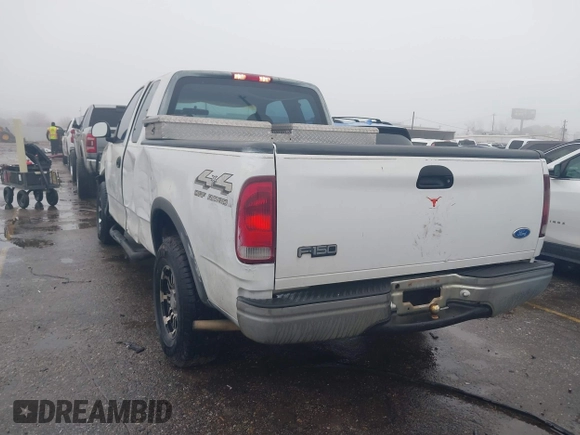 1997 Ford F-150 XL with VIN 1FTDX1863VNB01474, listed as a IAAI auction lot 41446672 with 223,296 mi miles. Bid and sale history available at carsss.com. Image 3.