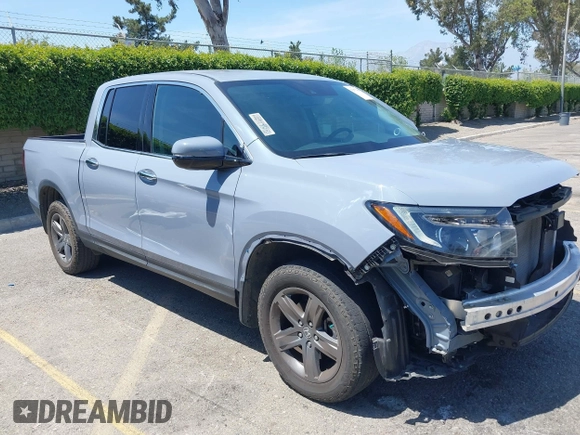 2022 Honda Ridgeline RTL-E z VIN 5FPYK3F78NB028776, wystawiony jako IAAI lot #42077805 z przebiegiem 22 971 mil mil oraz . Historia ofert i sprzedaży dostępna na DreamBid. Obrazek 1.