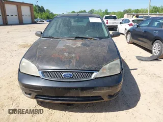 2006 Ford Focus S z VIN 1FAFP31N76W249134, wystawiony jako IAAI lot #41951073 z przebiegiem 152 065 mil mil oraz . Historia ofert i sprzedaży dostępna na DreamBid. Obrazek 12.