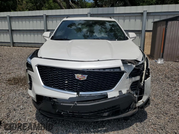 2019 Cadillac XT4 FWD Sport z VIN 1GYFZER47KF187301, wystawiony jako Copart lot #57715115 z przebiegiem 64 246 mil mil oraz Szkody całkowita. Historia ofert i sprzedaży dostępna na DreamBid. Obrazek 5.
