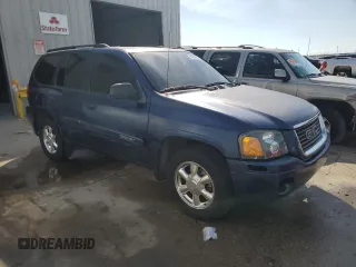 2004 GMC Envoy SLE with VIN 1GKDS13S842402250, listed as a Copart auction lot 54941005 with 163,380 mi miles and Salvage Title. Bid and sale history available at DreamBid. Image 4.