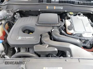 2015 Ford Fusion S Hybrid with VIN 3FA6P0UU7FR167229, listed as a IAAI auction lot 41684934 with 135,317 mi miles. Bid and sale history available at carsss.com. Image 10.