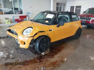 2015 MINI Hardtop with VIN WMWXM5C57FT942137, listed as a IAAI auction lot 42146541 with 96,058 mi miles and . Bid and sale history available at DreamBid. Image 2.