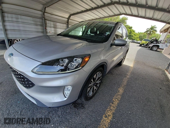 2020 Ford Escape Titanium Hybrid z VIN 1FMCU0DZ3LUB82649, wystawiony jako IAAI lot #42621618 z przebiegiem 46 265 mil mil oraz . Historia ofert i sprzedaży dostępna na DreamBid. Obrazek 12.