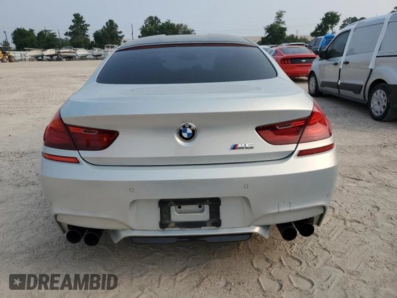 2017 BMW M6 z VIN WBS6E9C56HG437374, wystawiony jako Copart lot #54277624 z przebiegiem 80 858 mil mil oraz . Historia ofert i sprzedaży dostępna na DreamBid. Obrazek 6.