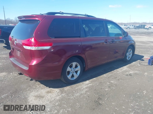 2012 Toyota Sienna LE AAS with VIN 5TDKK3DCXCS244605, listed as a IAAI auction lot 41516400 with 186,198 mi miles. Bid and sale history available at carsss.com. Image 4.
