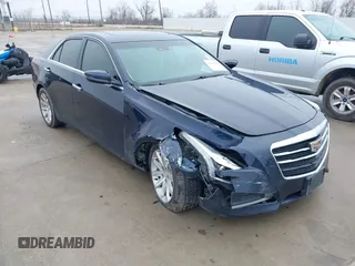 2015 Cadillac CTS Luxury RWD with VIN 1G6AR5SX1F0108785, listed as a IAAI auction lot 41449429 with 128,074 mi miles and . Bid and sale history available at DreamBid. Image 1.