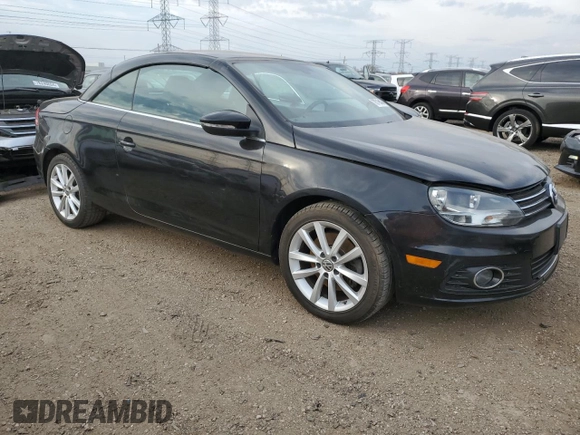 2015 Volkswagen Eos Komfort with VIN WVWBW8AH4FV001321, listed as a Copart auction lot 78718404 with 73,296 mi miles and Salvage Title. Bid and sale history available at DreamBid. Image 4.