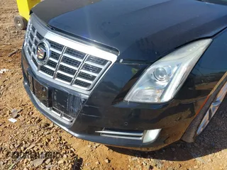 2014 Cadillac XTS Luxury z VIN 2G61M5S30E9229758, wystawiony jako IAAI lot #42179952 z przebiegiem 125 848 mil mil oraz . Historia ofert i sprzedaży dostępna na DreamBid. Obrazek 6.