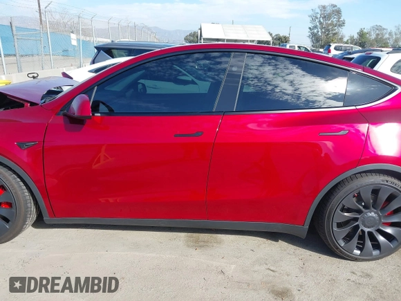 2024 Tesla Model Y Performance with VIN 7SAYGDEF3RF032980, listed as a IAAI auction lot 41619450 with 12,105 mi miles and . Bid and sale history available at DreamBid. Image 14.