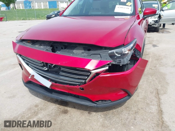 2016 Mazda CX-9 Touring with VIN JM3TCACY4G0112961, listed as a IAAI auction lot 42094718 with 114,679 mi miles and . Bid and sale history available at DreamBid. Image 6.