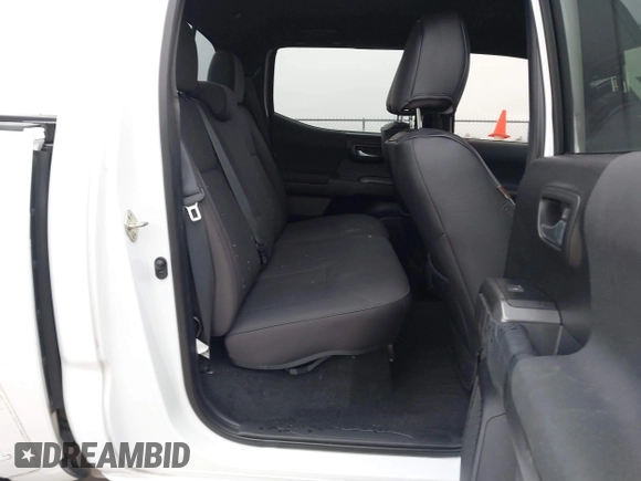 2019 Toyota Tacoma SR z VIN 3TMCZ5AN4KM220154, wystawiony jako IAAI lot #41602065 z przebiegiem 92 345 mil mil oraz . Historia ofert i sprzedaży dostępna na DreamBid. Obrazek 8.
