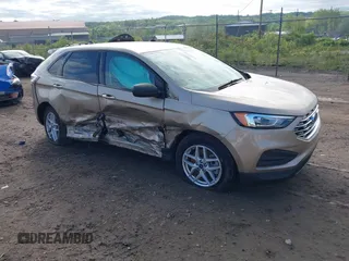 2021 Ford Edge SE with VIN 2FMPK4G90MBA19667, listed as a IAAI auction lot 42215758 with 27,496 mi miles and . Bid and sale history available at DreamBid. Image 1.