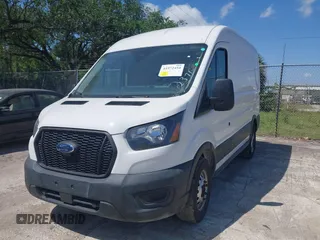 2023 Ford Transit Cargo with VIN 1FTBR2C87PKB38306, listed as a IAAI auction lot 41972454 with 51,049 mi miles and . Bid and sale history available at DreamBid. Image 2.