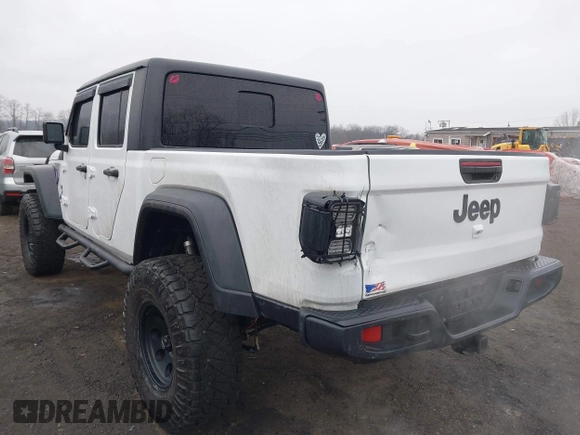 2020 Jeep Gladiator Sport S z VIN 1C6HJTAG0LL129461, wystawiony jako IAAI lot #41464713 z przebiegiem 66 625 mil mil oraz . Historia ofert i sprzedaży dostępna na DreamBid. Obrazek 6.