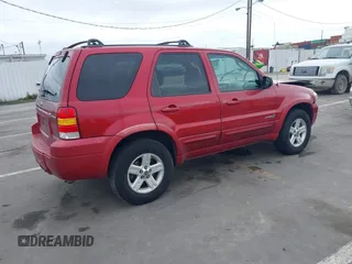2006 Ford Escape Hybrid with VIN 1FMCU96H96KA52738, listed as a IAAI auction lot 41773608 with 214,834 mi miles and . Bid and sale history available at DreamBid. Image 4.