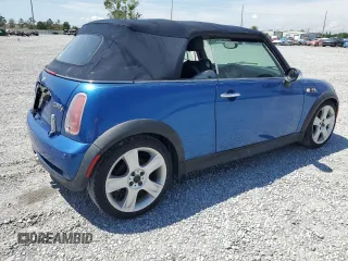 2006 MINI Convertible S with VIN WMWRH33566TK58973, listed as a Copart auction lot 51295575 with Not provided miles and Salvage title. Bid and sale history available at DreamBid. Image 3.