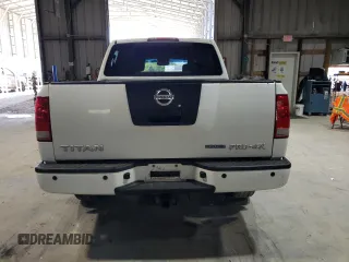 2010 Nissan Titan Pro-4X with VIN 1N6BA0EC3AN312601, listed as a Copart auction lot 52633455 with 161,260 mi miles and Salvage title. Bid and sale history available at DreamBid. Image 6.