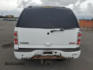 2005 GMC Yukon Denali z VIN 1GKEK63UX5J194771, wystawiony jako Copart lot #53170035 z przebiegiem 175 910 mil mil oraz Tytuł czysty. Historia ofert i sprzedaży dostępna na DreamBid. Obrazek 6.