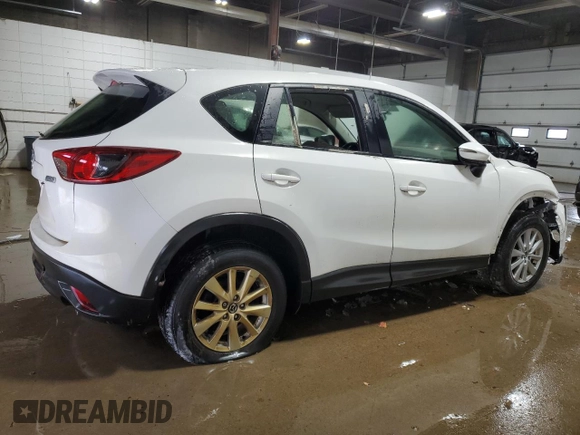 2015 Mazda CX-5 Sport with VIN JM3KE4BY4F0551679, listed as a Copart auction lot 68471374 with 198,987 mi miles and Non Repairable. Bid and sale history available at carsss.com. Image 3.