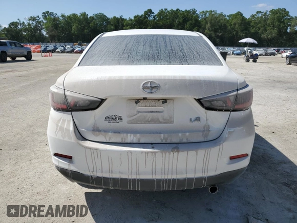 2016 Scion iA z VIN 3MYDLBZV8GY109648, wystawiony jako Copart lot #55254915 z przebiegiem 147 420 mil mil oraz Szkody całkowita. Historia ofert i sprzedaży dostępna na DreamBid. Obrazek 6.