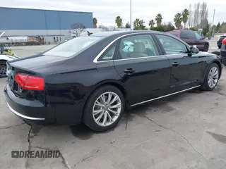 2012 Audi A8 L with VIN WAURVAFD7CN005452, listed as a IAAI auction lot 41529084 with 80,738 mi miles. Bid and sale history available at carsss.com. Image 4.
