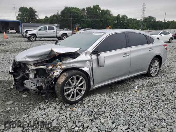 2013 Toyota Avalon XLE with VIN 4T1BK1EB1DU069129, listed as a Copart auction lot 58949285 with 145,431 mi miles and Salvage title. Bid and sale history available at DreamBid. Image 1.