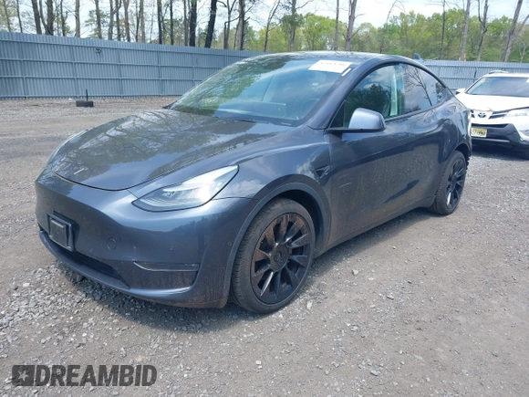 2020 Tesla Model Y Long Range with VIN 5YJYGDEE2LF029385, listed as a IAAI auction lot 42164786 with 58,685 mi miles and . Bid and sale history available at DreamBid. Image 19.