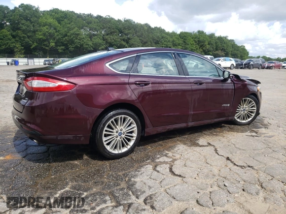 2013 Ford Fusion SE Hybrid z VIN 3FA6P0LU7DR197801, wystawiony jako Copart lot #60468095 z przebiegiem 169 215 mil mil oraz Szkoda całkowita • Salvage title. Historia ofert i sprzedaży dostępna na DreamBid. Obrazek 3.