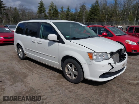 2012 Dodge Grand Caravan SXT with VIN 2C4RDGCGXCR248859, listed as a IAAI auction lot 41829411 with 111,515 mi miles and . Bid and sale history available at DreamBid. Image 1.
